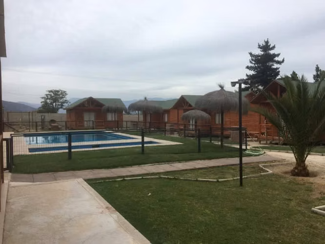 HERMOSA PARCELA EN LIMACHE CON CASA Y CABAÑAS.
