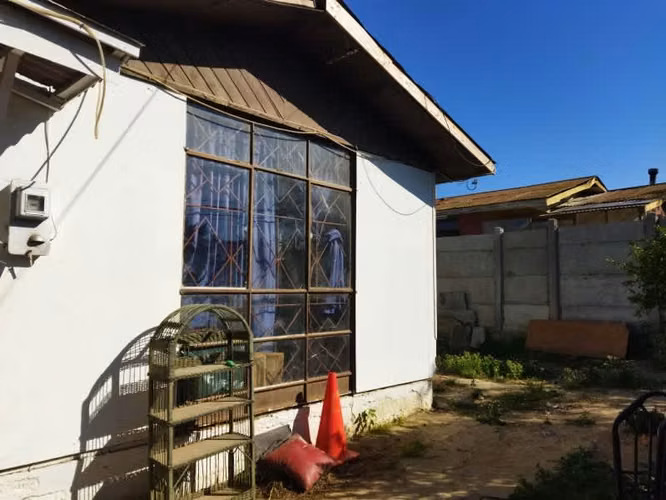 TERRENO PLANO URBANIZADO CON CONSTRUCCIÓN LIVIANA - Imagen 2