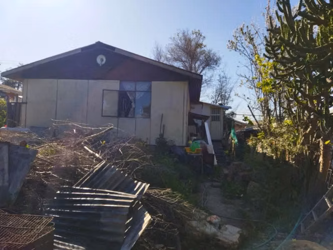 TERRENO PLANO URBANIZADO CON CONSTRUCCIÓN LIVIANA - Imagen 5