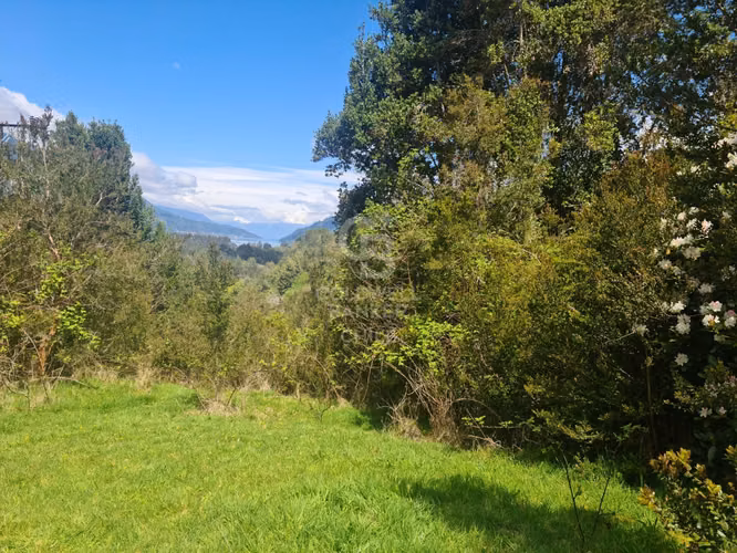 Oportunidad! Parcela con frutales, vista Volcán y riachuelo