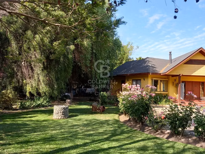 Parcela en calle principal Isla de Maipo