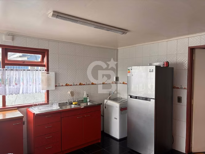 Propiedad con uso comercial y habitacional
