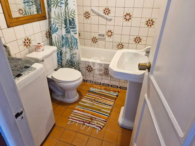 Propiedad con uso comercial y habitacional
