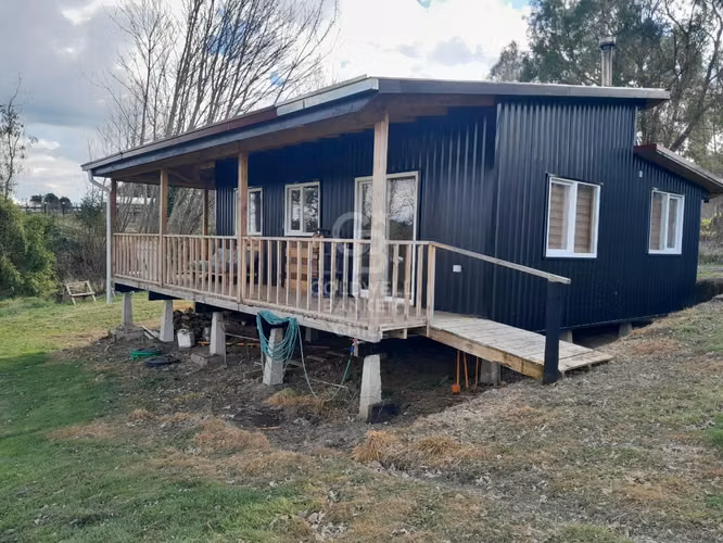 Parcela con Dos Cabañas en Funcionamiento - Oportunidad