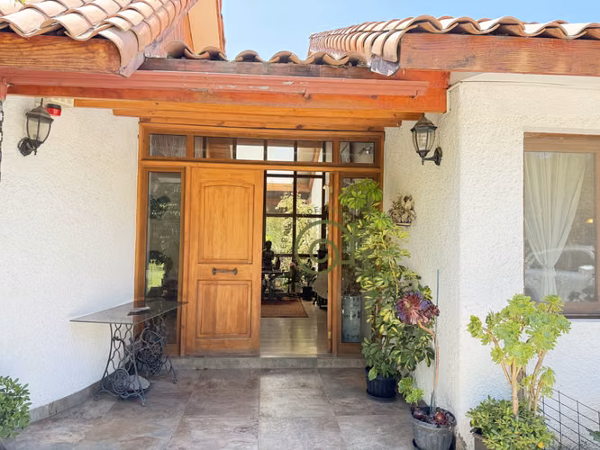 VENTA DE PARCELA CON PISCINA Y HERMOSO JARDÍN