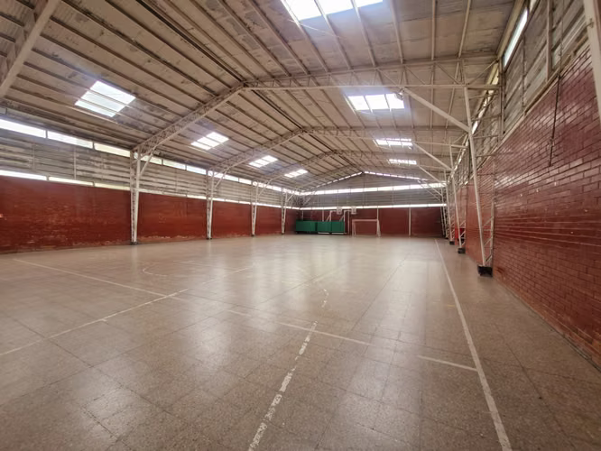 Gran Terreno 8.864 M2 con gimnacio en funcionamiento gran plusvalia