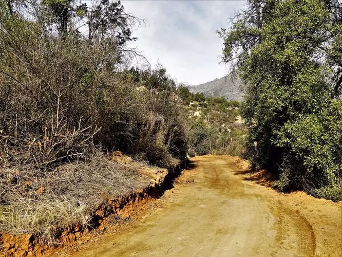 Parcela 4,69 ha con casa en venta en Olmué.