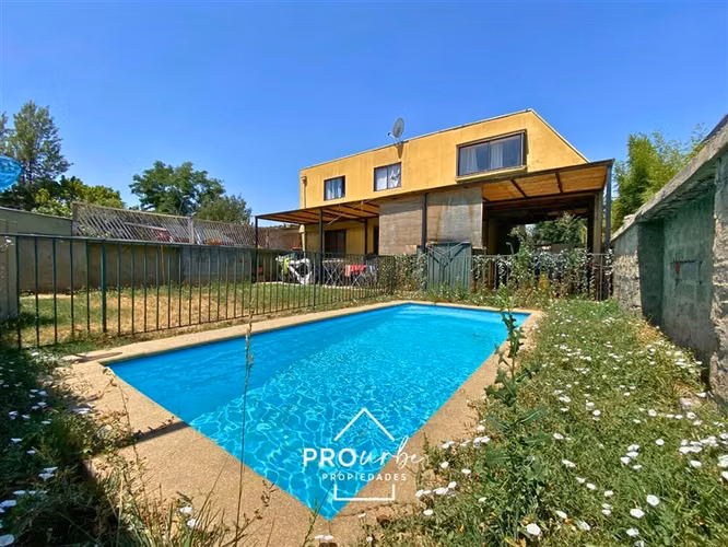 Casa con potencial residencial y comercio menor Ñuñoa