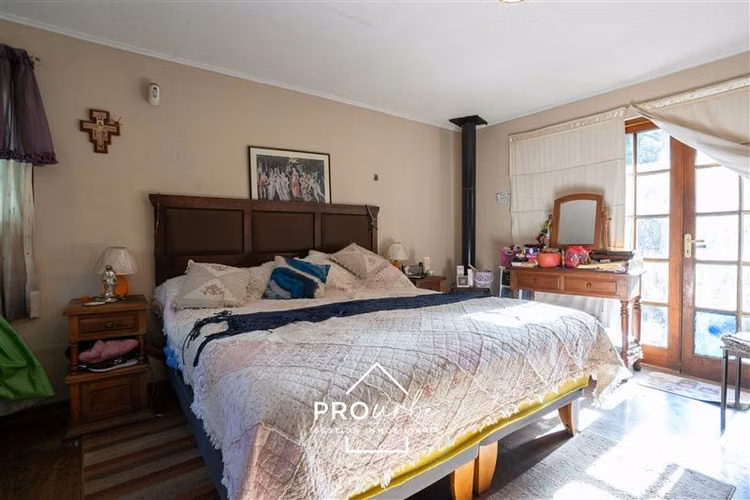 Parcela casa principal, más 2 cabañas, con derecho de agua
