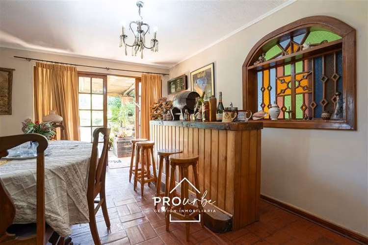 Parcela casa principal, más 2 cabañas, con derecho de agua