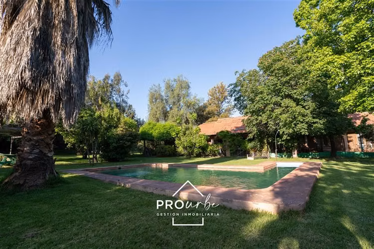 Parcela casa principal, más 2 cabañas, con derecho de agua