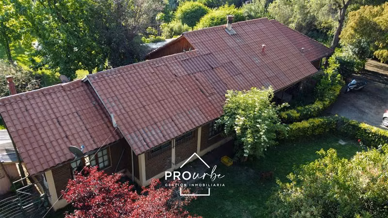 Parcela casa principal, más 2 cabañas, con derecho de agua