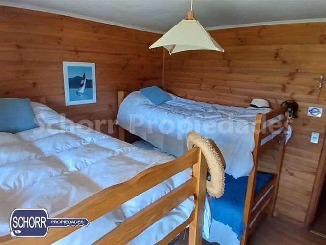 Parcela con casa y playa en venta lago Colbun