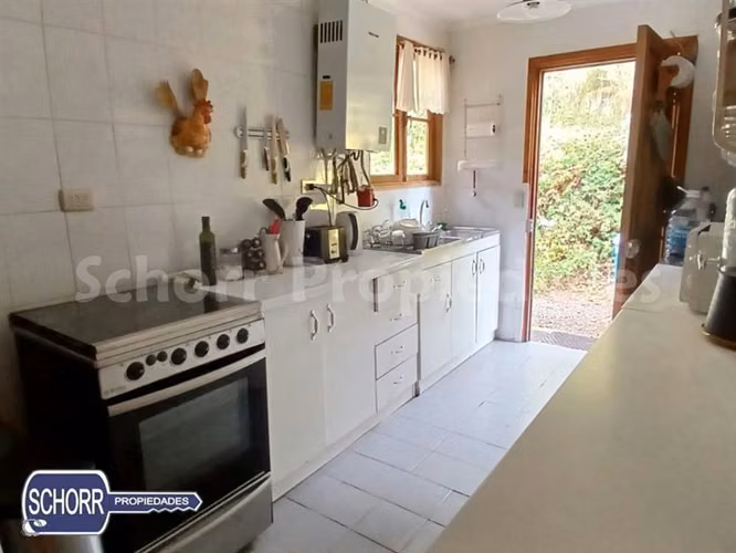 Parcela con casa y playa en venta lago Colbun