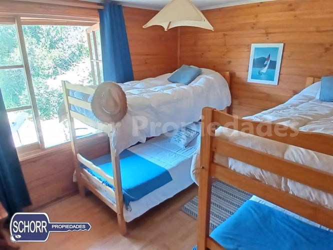 Parcela con casa y playa en venta lago Colbun