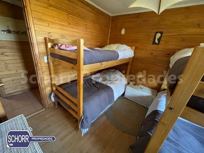 Parcela con casa y playa en venta lago Colbun
