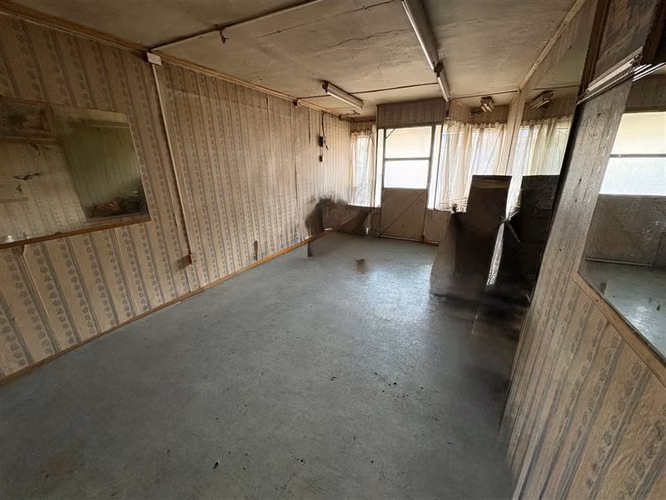 Terreno en venta con 2 casas en Punta Arenas