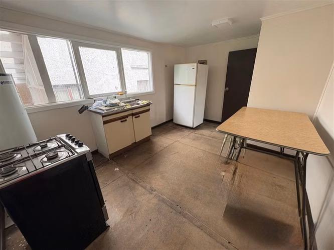 Terreno en venta con 2 casas en Punta Arenas