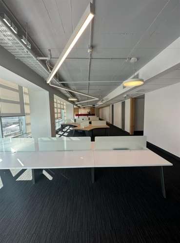 Arriendo OFICINA en Edificio Torres del Parque en Las Condes - Imagen 5