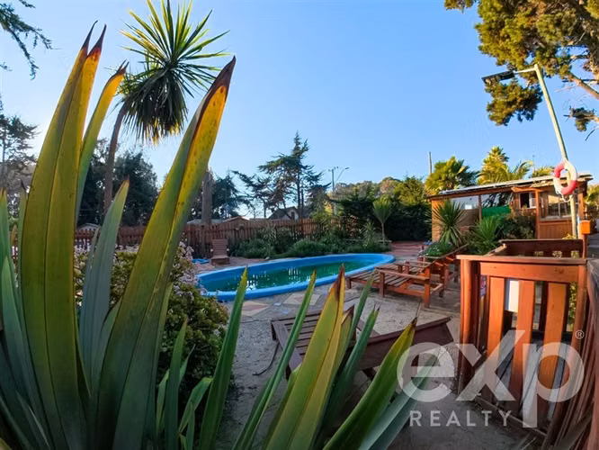 Complejo turístico 21 cabañas con piscina solar Isla Negra