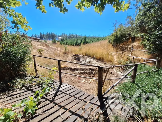 Venta de sitio con casa en Pichilemu