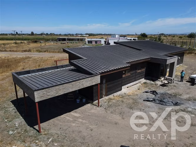 Parcela con gran casa en venta en Chillán