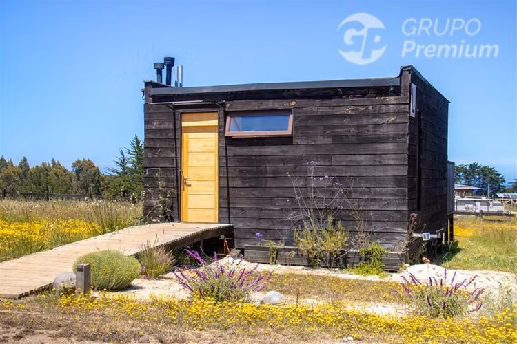 Parcela con Inversión Turística de 4 cabañas en Pichilemu