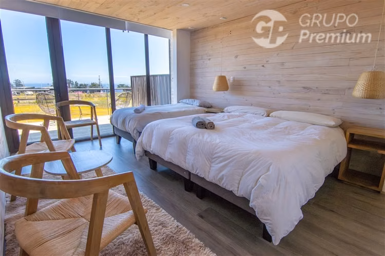 Parcela con Inversión Turística de 4 cabañas en Pichilemu