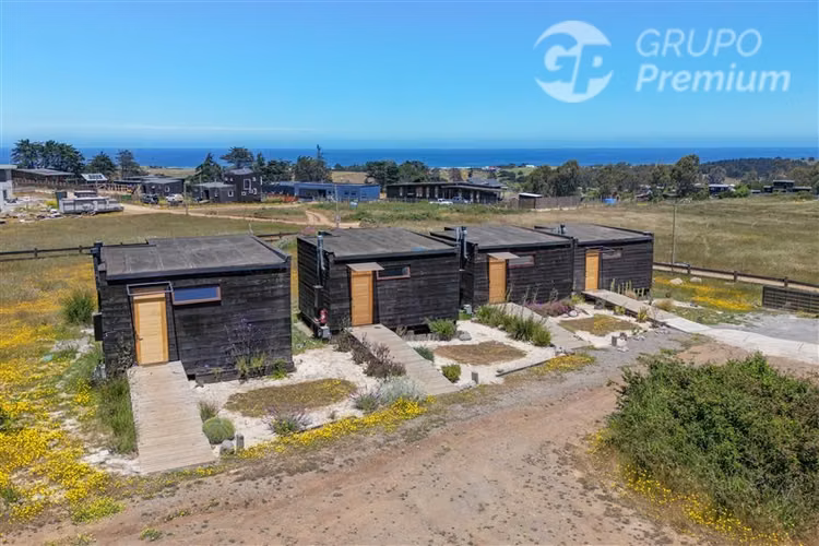 Parcela con Inversión Turística de 4 cabañas en Pichilemu