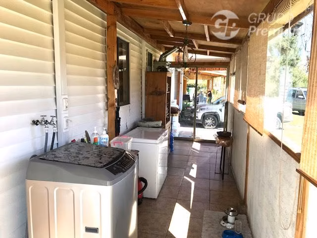 Parcela en venta Peñaflor con 2 casas piscina quincho 5D 4B