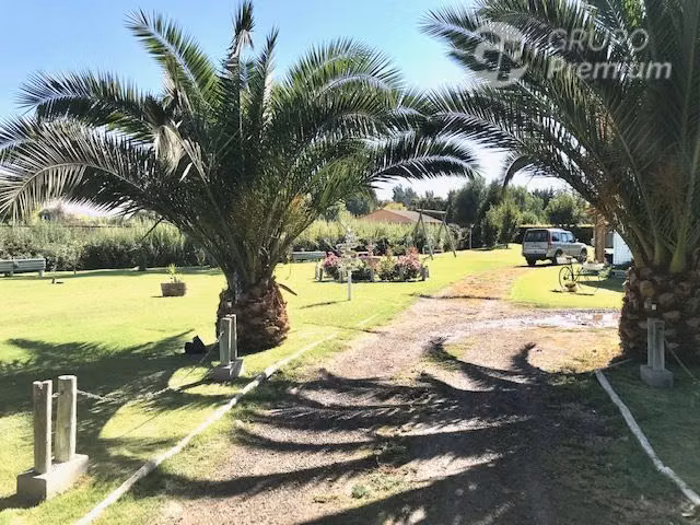 Parcela en venta Peñaflor con 2 casas piscina quincho 5D 4B