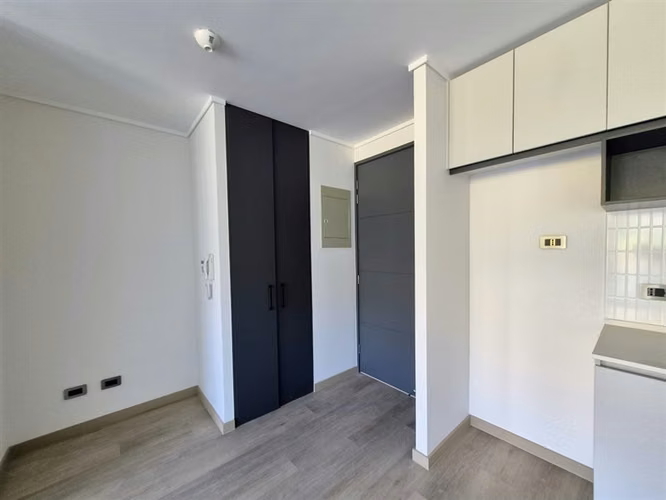 Departamento en venta de 2 dorm. con jardín en Huechuraba