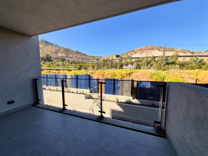 Departamento en venta de 2 dorm. con jardín en Huechuraba