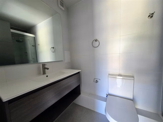 Departamento en venta de 2 dorm. con jardín en Huechuraba