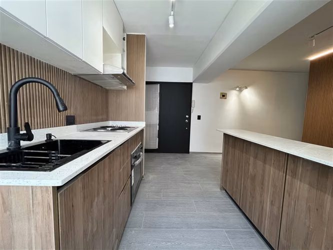 Remodelado depto Nueva Los Leones 1 dorm. en Providencia - Imagen 12