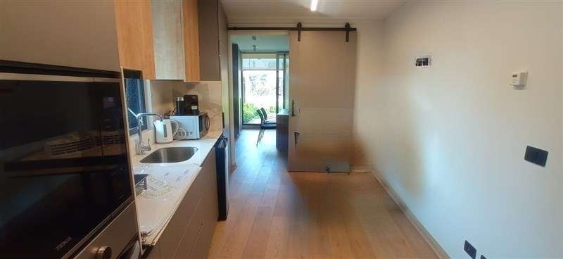 Departamento en venta de 1 dorm.1B jardin privado Vitacura