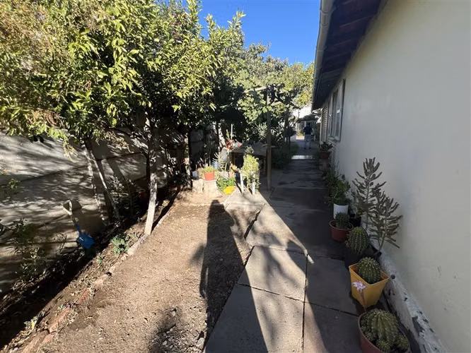 Vendo casa 4 Dormitorios 2 BañosJardín amplio Villa Macul