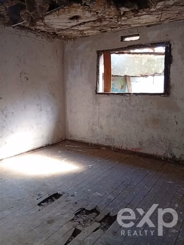 terreno con casa que se incendio bien ubicada . en Copiapó