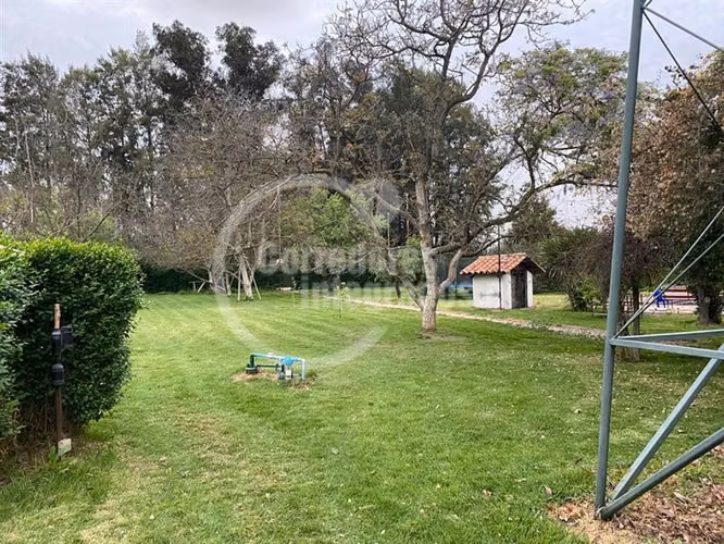 Agrícola,con dos casas en venta, piscina ,tenis en Peñaflor