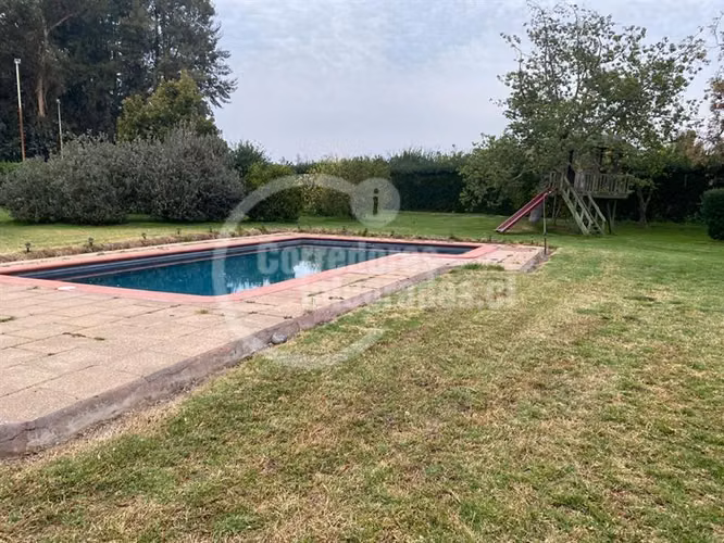 Agrícola,con dos casas en venta, piscina ,tenis en Peñaflor