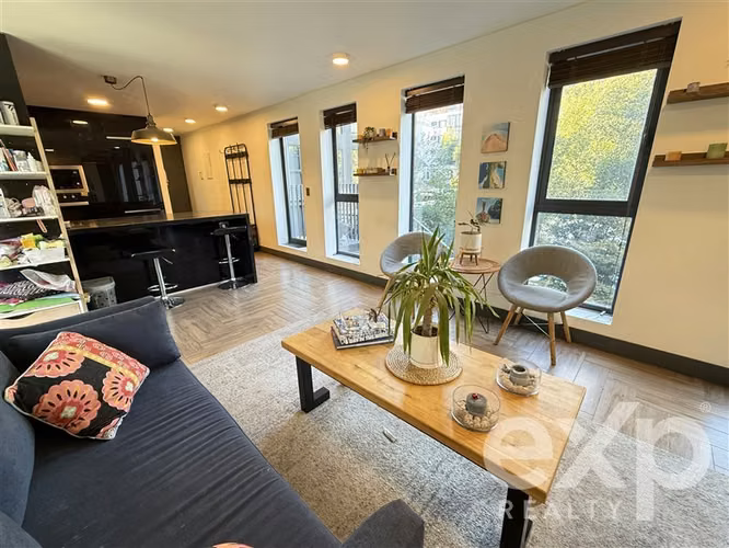 DEPARTAMENTO CON JARDIN PRIVADO Y QUINCHO