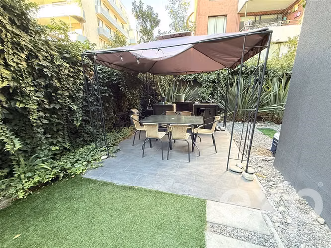 DEPARTAMENTO CON JARDIN PRIVADO Y QUINCHO