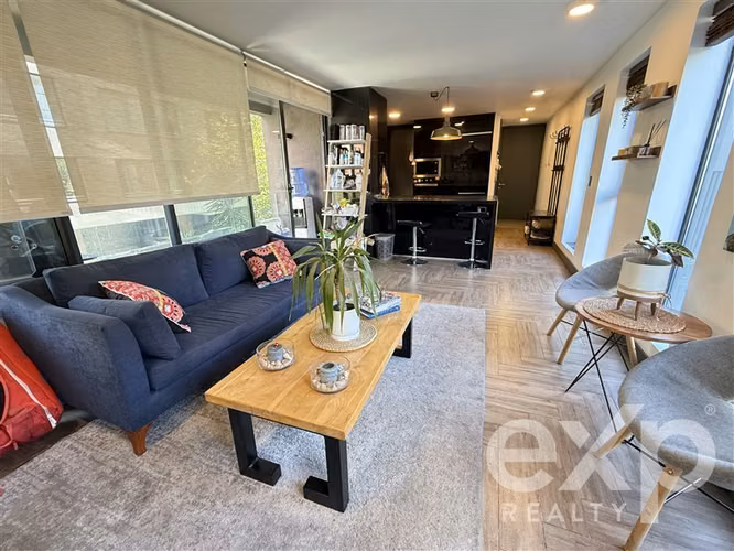 DEPARTAMENTO CON JARDIN PRIVADO Y QUINCHO