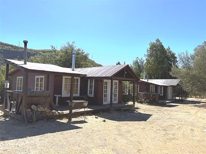 Parcela en venta con tres cabañas en San Fabián, Chillán