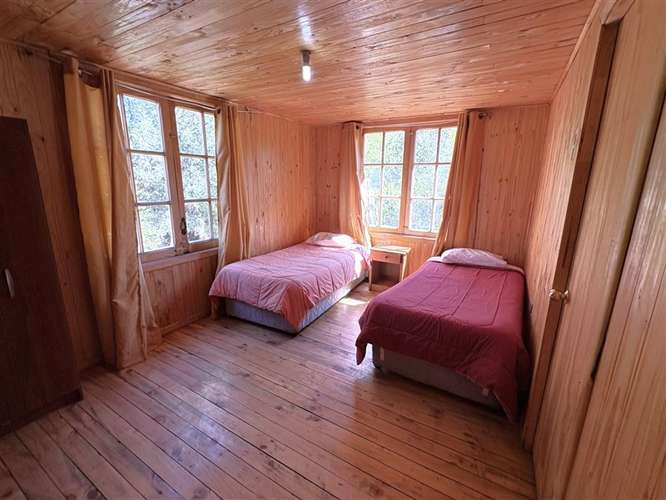 Parcela en venta con tres cabañas en San Fabián, Chillán - Imagen 7