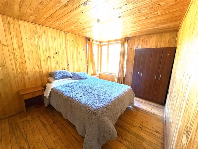 Parcela en venta con tres cabañas en San Fabián, Chillán