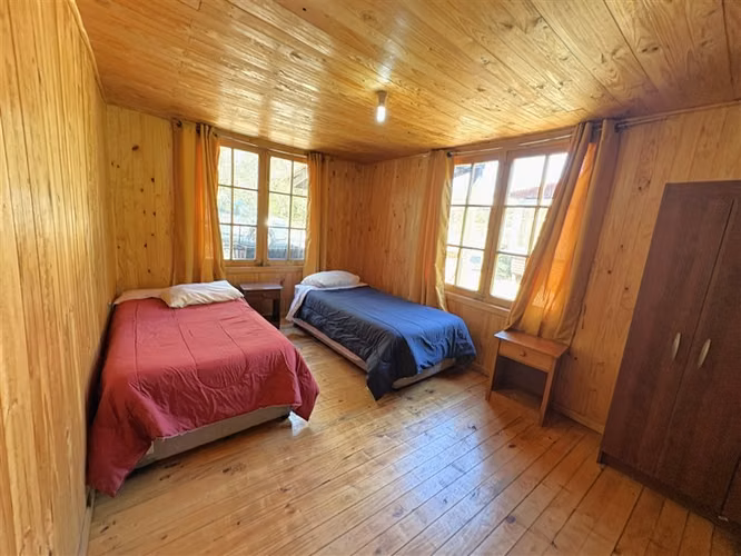 Parcela en venta con tres cabañas en San Fabián, Chillán