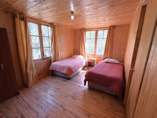 Parcela en venta con tres cabañas en San Fabián, Chillán