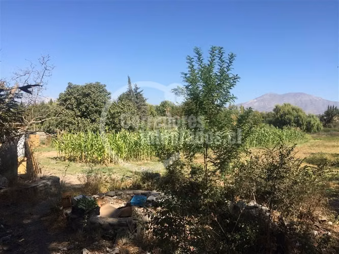 Sitio en Venta plano en Pirque, derechos de agua