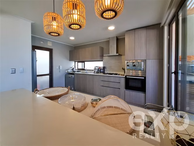 Casa con terraza panorámica y vista a Santiago en Alto Macul